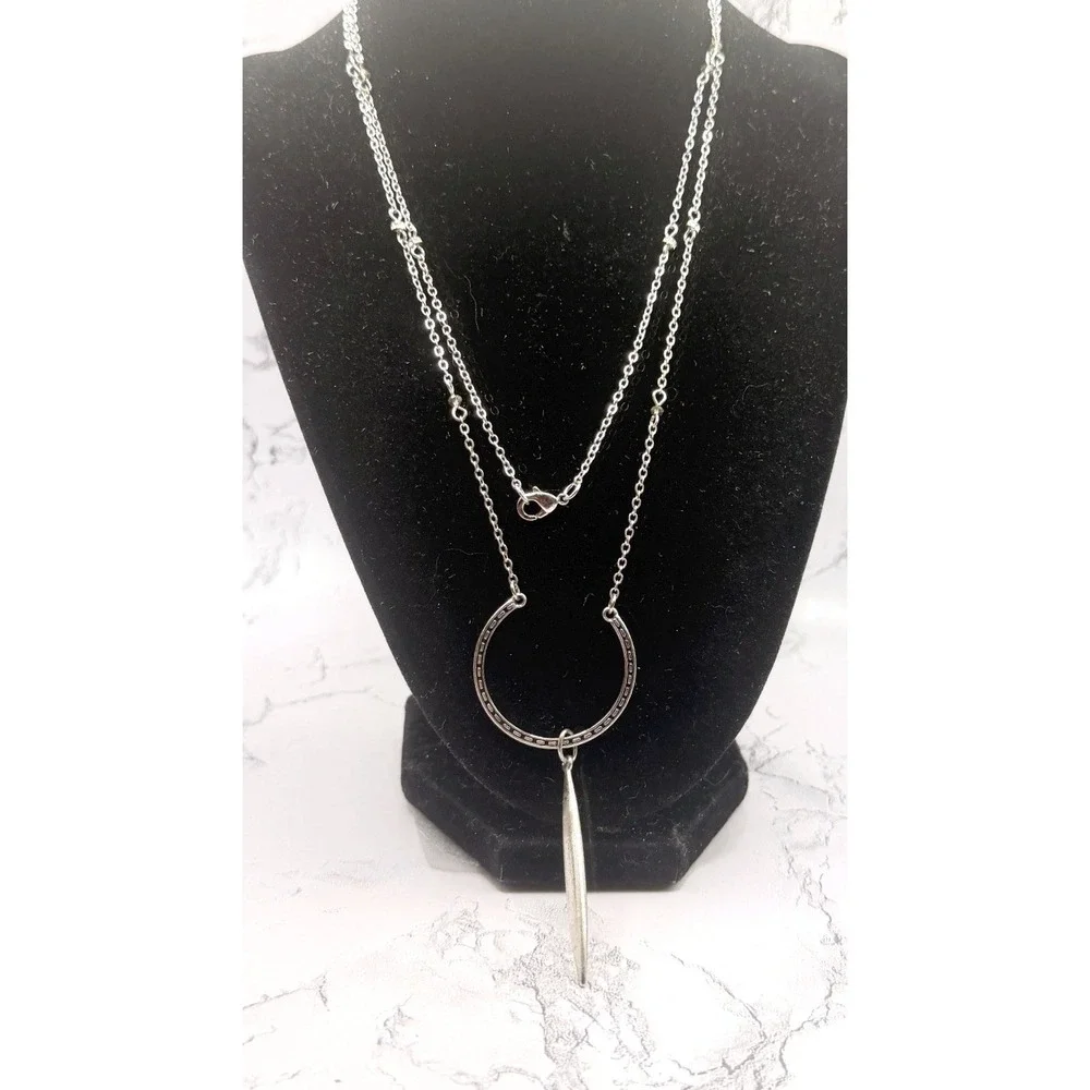 Source Unknown long silver